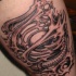 biomeccanica nero traceri tatuaggio