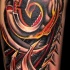 biomech strutture tatuaggio colorato