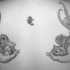 Tatuaggio sulla schiena due uccelli