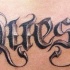 quest testo tatuaggio nero