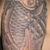Le tatouage de carpe koї en noir