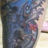 PESCE KOI  BLU CON KANJI TATUAGGIO