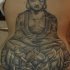 el tatuaje de buddha en la flor de loto
