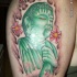 budda statua pitra verde tatuaggio