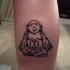 buddha glad con pancia tatuaggio