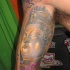 buddha pietra testa 3d tatuaggio sul braccio