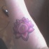 loto viola buddhista tatuaggio