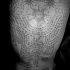 Le tatouage originaire bouddhiste de tout le dos