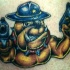 bulldog scerifo con pistole tatuaggio