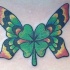 quadrifoglio con ali di farfalla tatuaggio