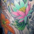 Tatuaje multicolor de muchas flores