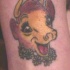 Tatuaje de vaca feliz de dibujos animados