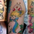 Classici personaggi dei cartoni animati tatuati