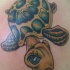 Tatouage de tortue de dessin animé en jaune et vert