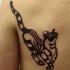gatto tribale a strisce tatuaggio nero