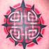 Le tatouage de soleil rouge et noir celtique