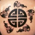 stile asiatico pietra simbolo tatuaggio