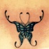 bellissima farfalla blu tatuaggio