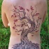 Tatuaggio grande sulla schiena l'albero fiorito