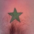 Tattoo von grünem Stern  auf der Brust