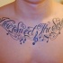Tattoo von Noten und Aufschrift 