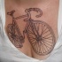 Bike chest tattoo