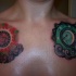 Two all-seeing eyes chest tattoo