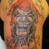 tatuaje de payaso riendo tiempos buenos, tiempos malos