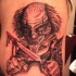 pagliaccio pazzo con coltelli tatuaggio