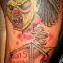 Jouette de voodoo zombie clown le tatouage