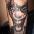 pagliaccio impazito tatuaggio sulla gamba