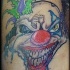 pagliaccio mezzo morto tatuaggio colorato