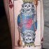 tatuaje de rey de corazones con calaveras