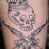 Ak - 47 e cranio in corona tatuaggio