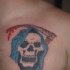 tatuaje en color de la muerte riendo
