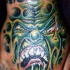 tatuaje obra de arte de criatura fea verde