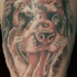 tatuaje de perro con la lengua fuera
