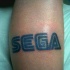 Sega blu logo tatuaggio