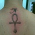 occhio egiziano con ankh tatuaggio