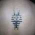 Tatuaje negro de deidad Anubis