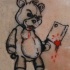 Tatuaje oso Teddy con cuchillo grande