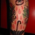 Tatuaje de ojo llorando a paraguas