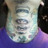 quattro occhi sul collo tatuaggio