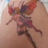 fata volante colorata tatuaggio