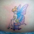tinkerbell trilli sul fungo tatuaggio colorato