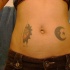 Tatuaggio sulla pancia la luna grande & il sole