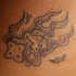 dado in fuoco tatuaggio