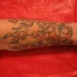 Tatuaje de llamas de fuego en la mano