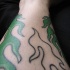 fuoco verde tatuaggio