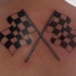 bandiere bianco nero a scacchi da corsa tatuaggio